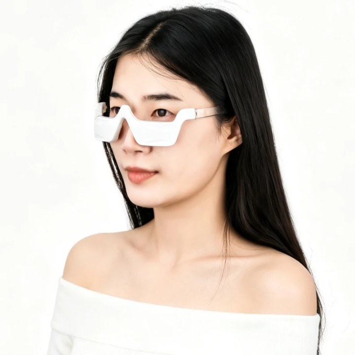 Woman wearing TRIMION AFRICA Smart Eye Massager